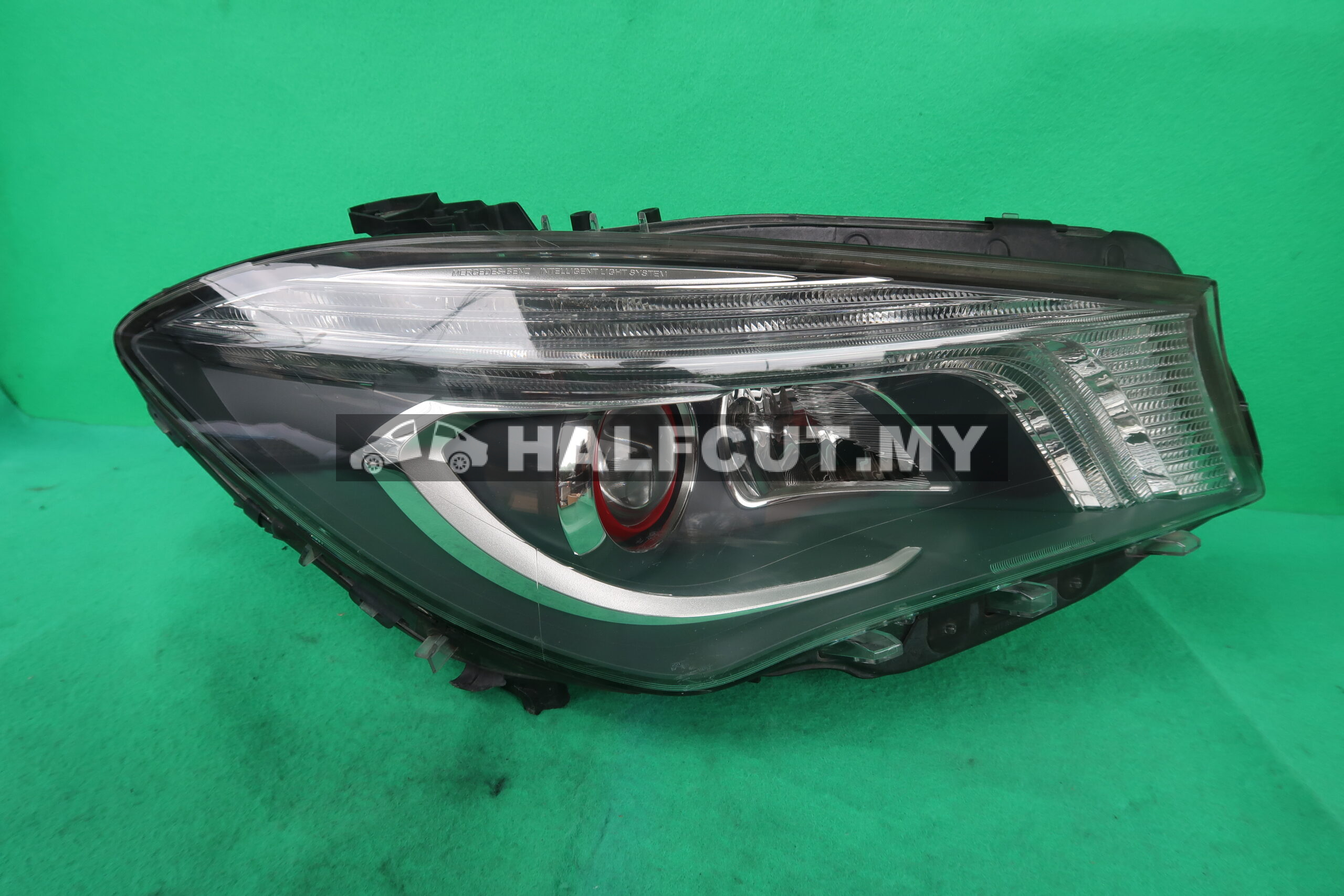 MERCEDES W117 HEADLAMP RH RED EYE