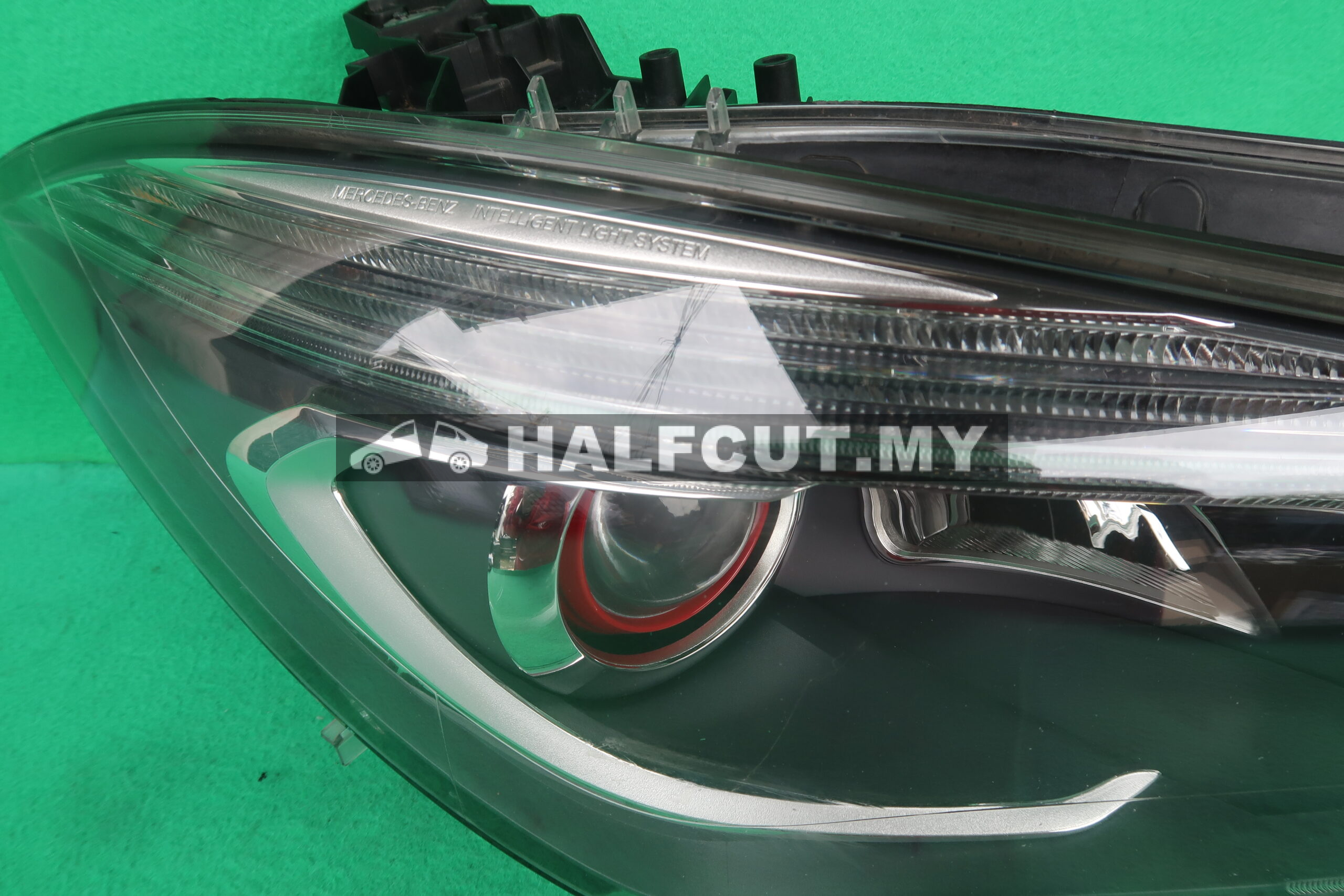 MERCEDES W117 HEADLAMP RH RED EYE